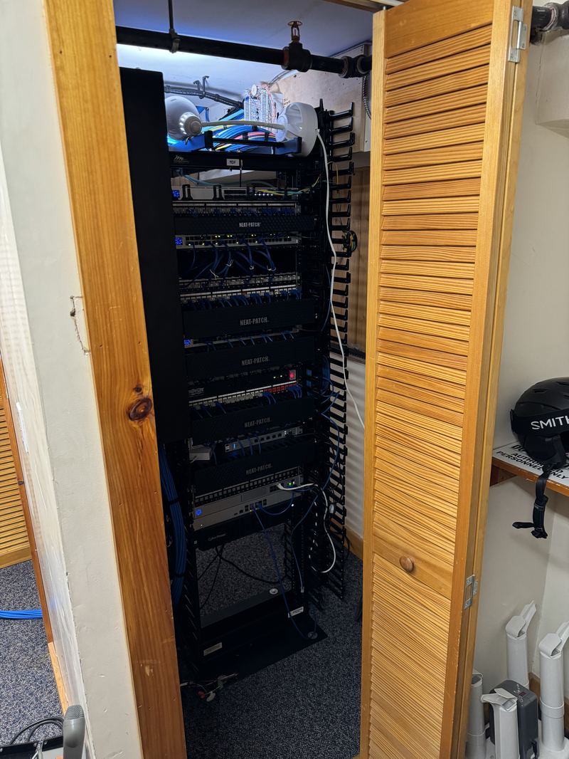 Clean organized server rack with Neat-Patch cable management after CompDAT build