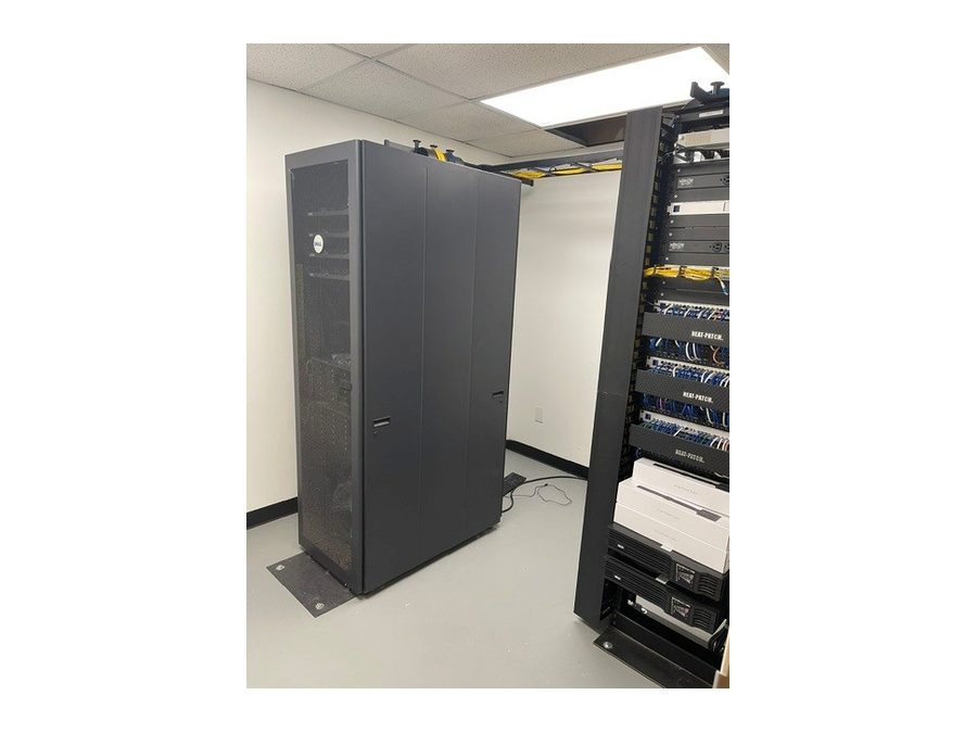 LAB Security server room after CompDAT renovation - enclosed server cabinet and networking rack with cable tray and Neat-Patch management